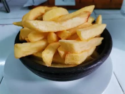 porción papas fritas